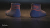 Runners wearing Balega running socks with a breakdown of anti-blister, moisture wicking design.
